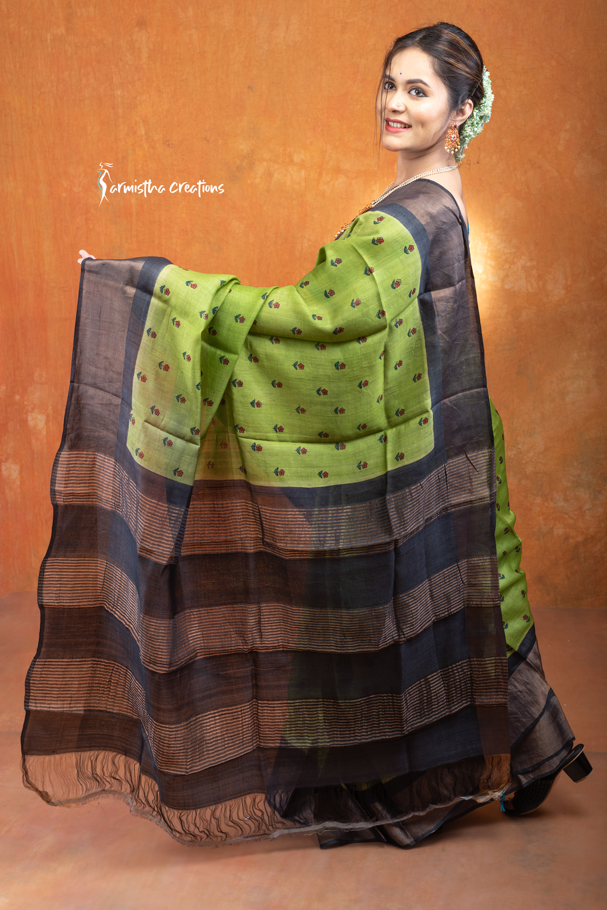 Hand block printed zari border tassar saree with Silk Mark certification.