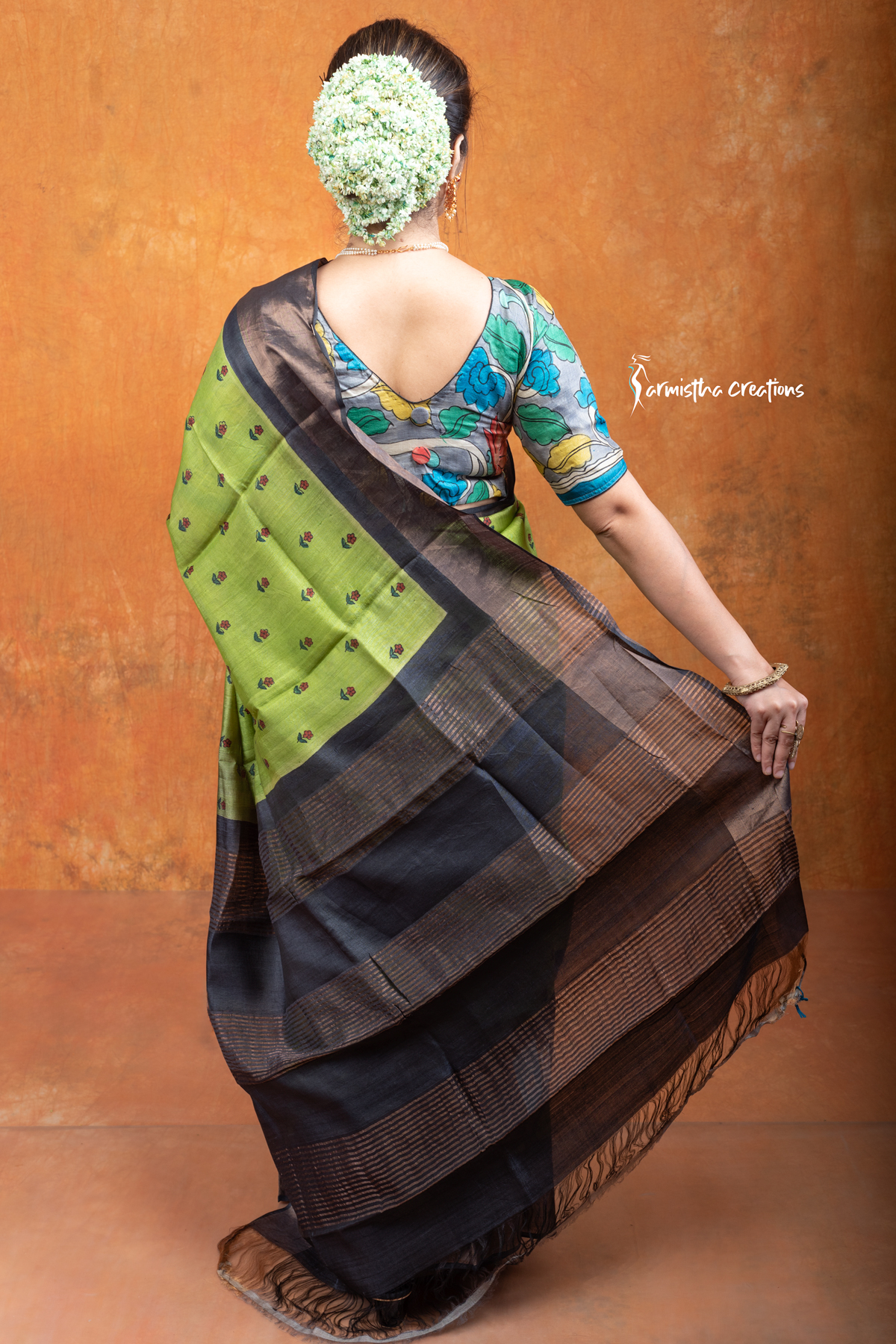 Hand block printed zari border tassar saree with Silk Mark certification.