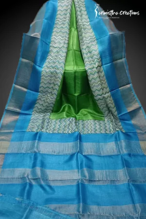 Hand block printed zari border tussar saree with Silk Mark certification.