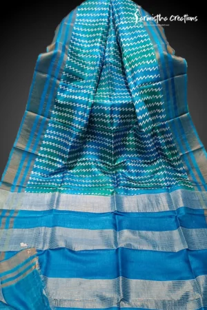 Hand block printed zari border tassar saree with Silk Mark certification.