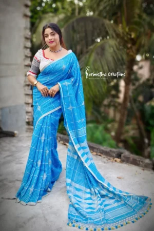 Pure handloom cotton saree with fine checks. sky blue.