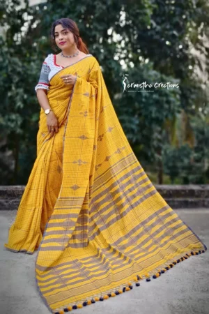 Pure handloom cotton saree with fine checks. Mustard yellow