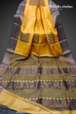 Hand block printed zari border tassar saree with Silk Mark certification.