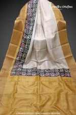 Hand block printed zari border tassar saree with Silk Mark certification.