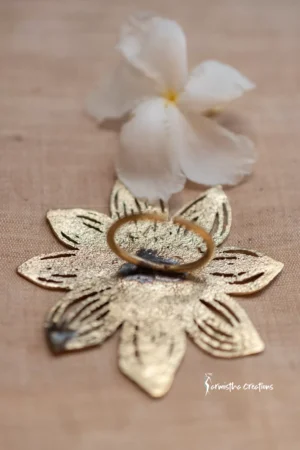 Traditional hand-made sunflower dokra ring (natural colour).