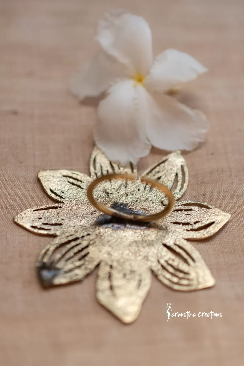 Traditional hand-made sunflower dokra ring (natural colour).