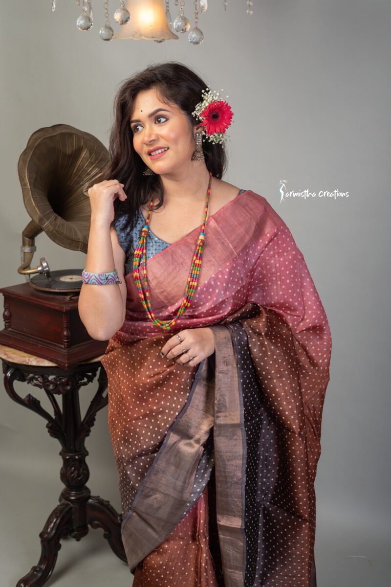 Hand block printed zari border tassar saree with Silk Mark certification.