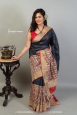 Hand block printed zari border tassar saree with Silk Mark certification.