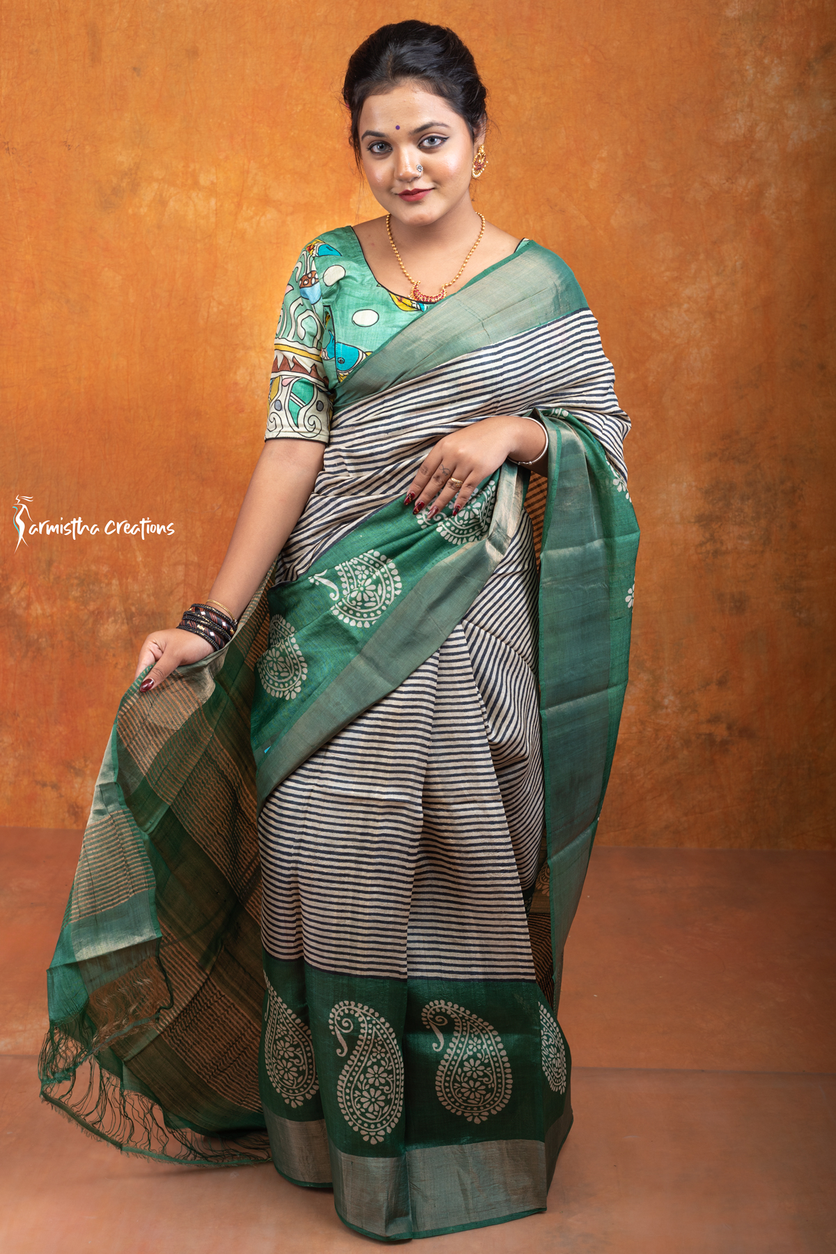 Hand block printed zari border tassar saree with Silk Mark certification.