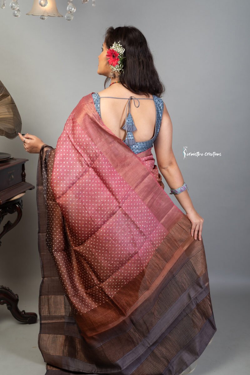 Hand block printed zari border tassar saree with Silk Mark certification.