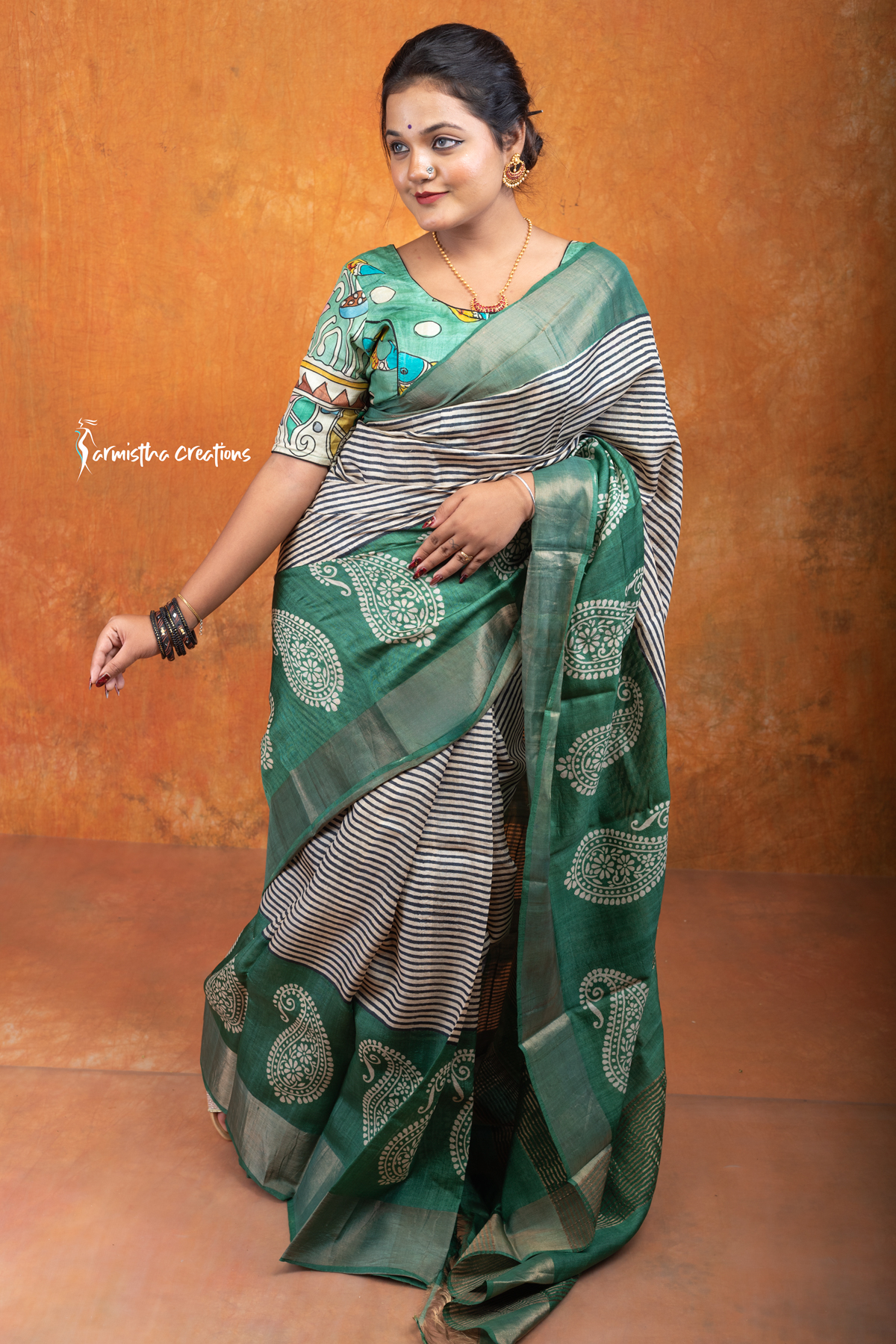 Hand block printed zari border tassar saree with Silk Mark certification.