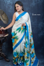 Radiate timeless elegance with Kiss of Red, a pure Bishnupuri silk saree hand-painted in vibrant scarlet with bold white floral motifs. Lightweight, luxurious, and effortlessly stunning — this saree captures passion and tradition in every drape.