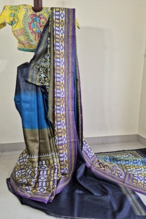 pure Gachi Tussar Kantha saree featuring an exquisite fusion dye that seamlessly transitions between royal blue, mehendi green, purple, and charcoal black