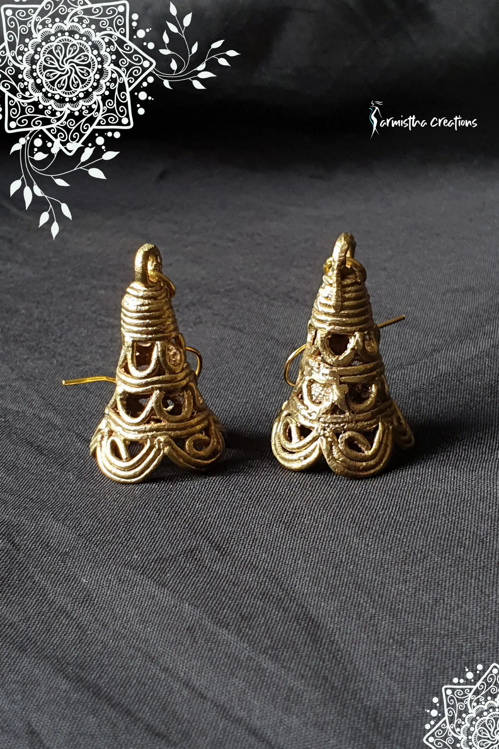 conical dokra earring with filigree work. hand-made tribal jewellery